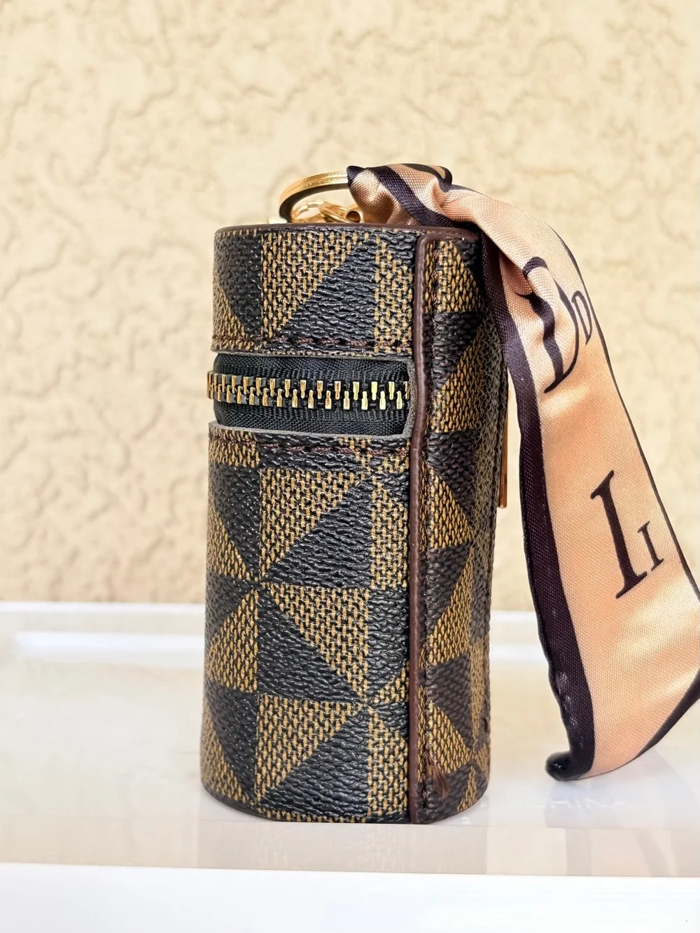 Brown Geometric Cylinder Keychain Pouch with Scarf Accent